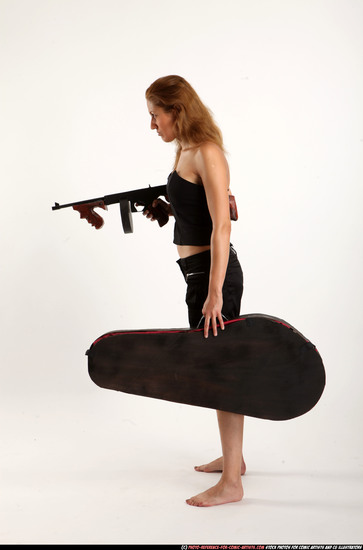 Woman Adult Athletic White Fighting with submachine gun Standing poses Casual