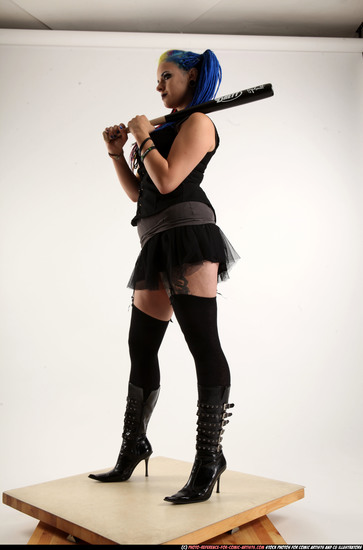 Woman Young Average White Standing poses Casual Fighting with bat