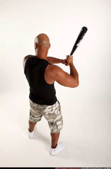 Man Adult Athletic Black Standing poses Sportswear Fighting with bat