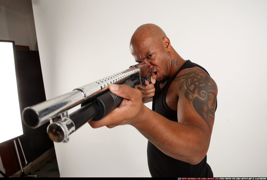 Man Adult Athletic Black Standing poses Sportswear Fighting with shotgun