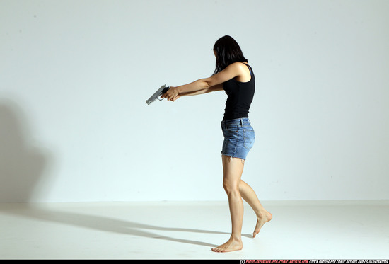 Woman Young Athletic White Fighting with gun Moving poses Casual