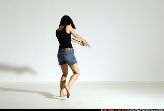 Woman Young Athletic White Fighting with gun Moving poses Casual