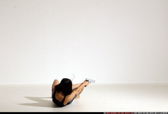 Woman Young Athletic White Fighting with gun Moving poses Casual