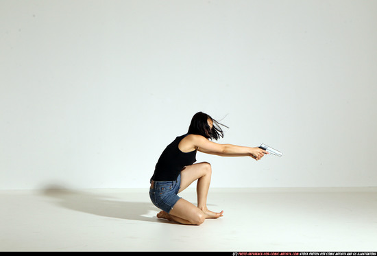 Woman Young Athletic White Fighting with gun Moving poses Casual