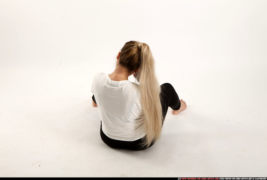 Woman Young Average Fighting with submachine gun Sitting poses Casual Asian