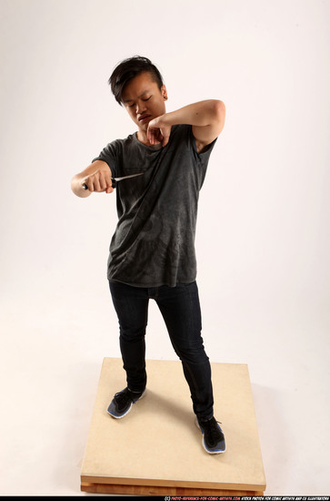 Man Young Athletic Fighting with knife Standing poses Casual Asian