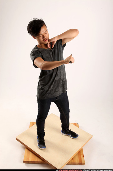 Man Young Athletic Fighting with knife Standing poses Casual Asian