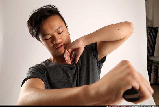 Man Young Athletic Fighting with knife Standing poses Casual Asian