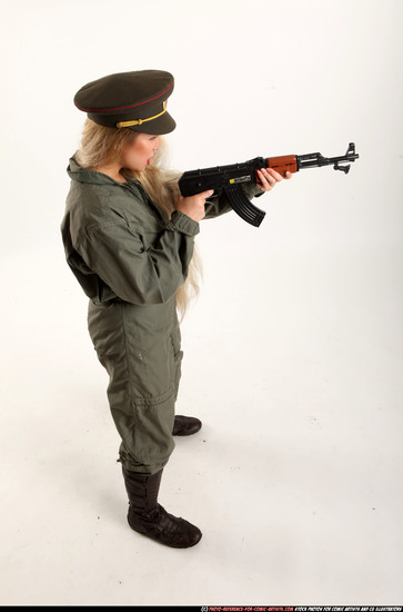 Woman Young Average Fighting with submachine gun Standing poses Army Asian