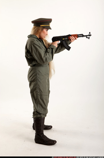 Woman Young Average Fighting with submachine gun Standing poses Army Asian