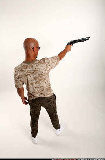 Man Adult Athletic Black Standing poses Army Fighting with shotgun