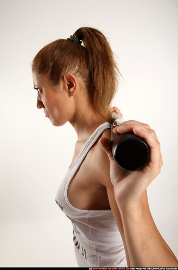 Woman Adult Athletic White Standing poses Casual Fighting with bat