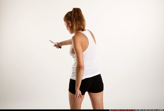 Woman Adult Athletic White Fighting with knife Standing poses Casual