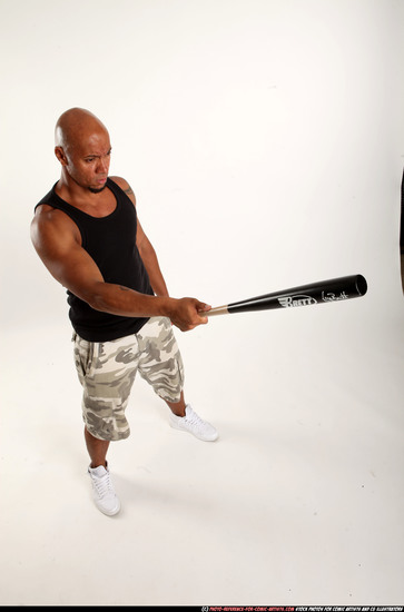 Man Adult Athletic Black Standing poses Sportswear Fighting with bat