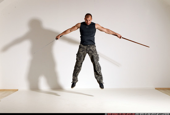 Man Adult Athletic White Fighting with sword Moving poses Sportswear