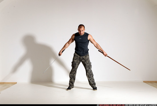 Man Adult Athletic White Fighting with sword Moving poses Sportswear