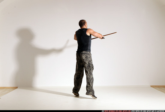 Man Adult Athletic White Fighting with sword Moving poses Sportswear