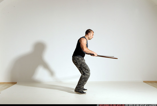 Man Adult Athletic White Fighting with sword Moving poses Sportswear