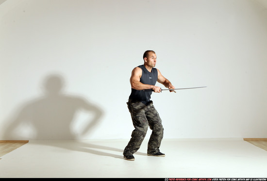 Man Adult Athletic White Fighting with sword Moving poses Sportswear