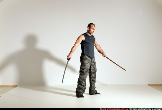 Man Adult Athletic White Fighting with sword Moving poses Sportswear