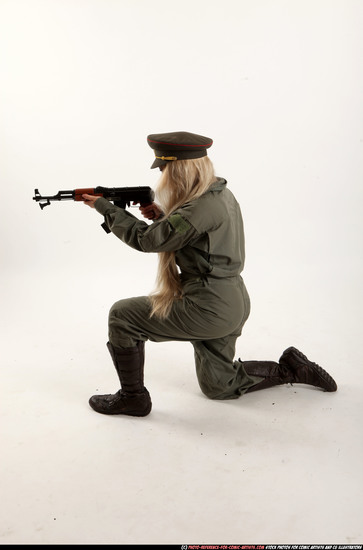 Woman Young Average Fighting with submachine gun Kneeling poses Army Asian