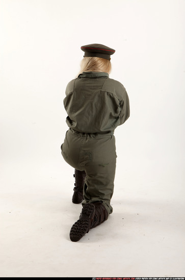 Woman Young Average Fighting with submachine gun Kneeling poses Army Asian