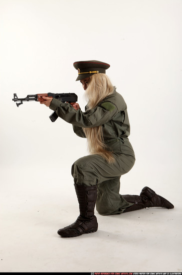 Woman Young Average Fighting with submachine gun Kneeling poses Army Asian