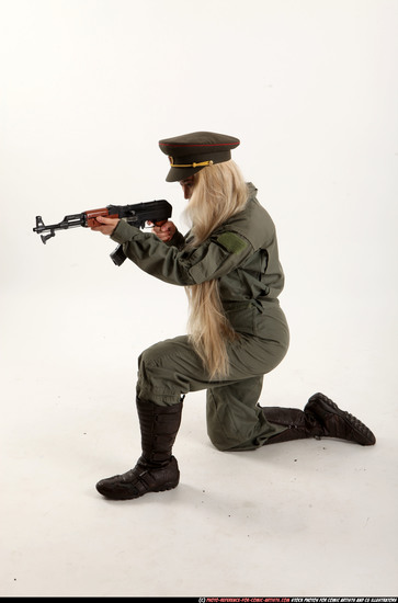 Woman Young Average Fighting with submachine gun Kneeling poses Army Asian