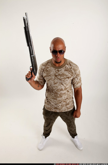 Man Adult Athletic Black Standing poses Army Fighting with shotgun