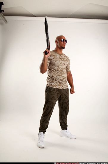 Man Adult Athletic Black Standing poses Army Fighting with shotgun