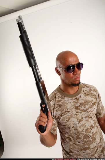 Man Adult Athletic Black Standing poses Army Fighting with shotgun