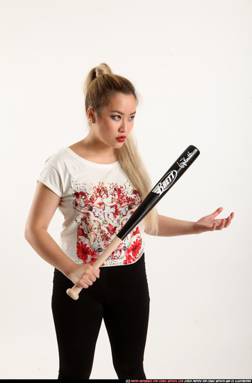 Woman Young Average Standing poses Casual Asian Fighting with bat