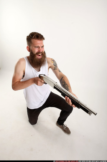 Man Adult Athletic White Kneeling poses Casual Fighting with shotgun