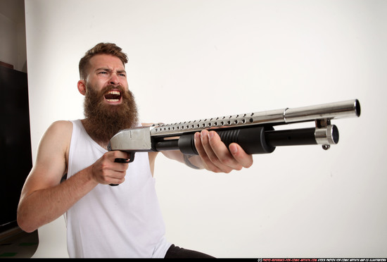 Man Adult Athletic White Kneeling poses Casual Fighting with shotgun