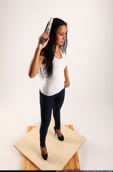 Woman Young Athletic Fighting with gun Standing poses Casual Latino