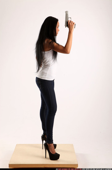 Woman Young Athletic Fighting with gun Standing poses Casual Latino