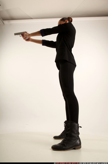 Woman Young Athletic White Fighting with gun Standing poses Casual