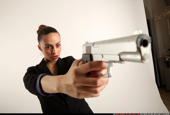 Woman Young Athletic White Fighting with gun Standing poses Casual