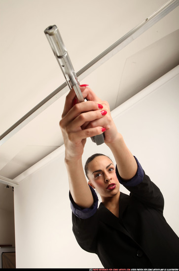 Woman Young Athletic White Fighting with gun Standing poses Casual