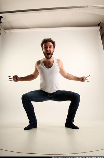 Man Adult Average White Fist fight Kneeling poses Casual