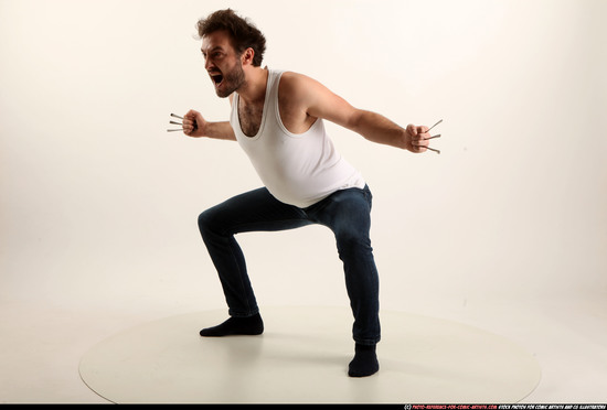 Man Adult Average White Fist fight Kneeling poses Casual