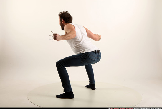 Man Adult Average White Fist fight Kneeling poses Casual