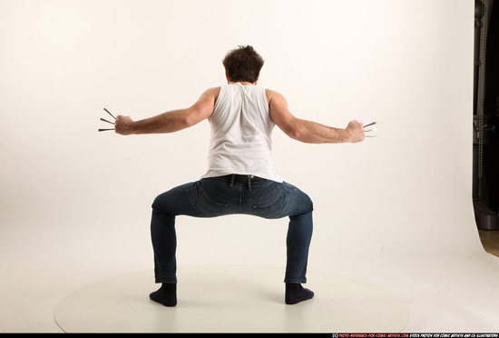 Man Adult Average White Fist fight Kneeling poses Casual