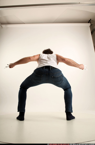 Man Adult Average White Fist fight Kneeling poses Casual