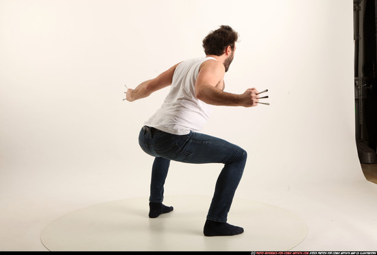 Man Adult Average White Fist fight Kneeling poses Casual