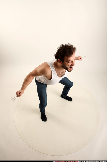 Man Adult Average White Fist fight Kneeling poses Casual