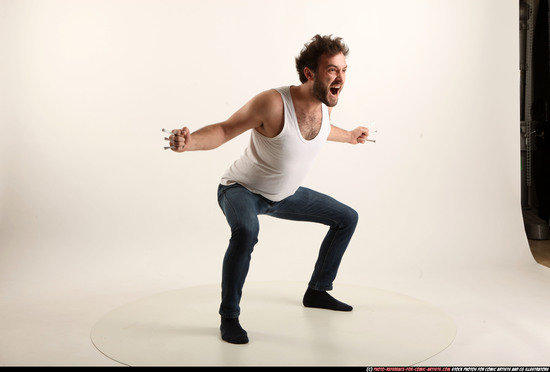 Man Adult Average White Fist fight Kneeling poses Casual