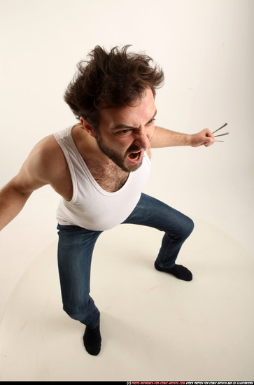 Man Adult Average White Fist fight Kneeling poses Casual