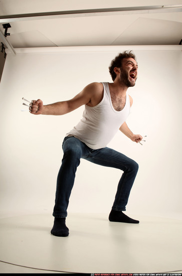 Man Adult Average White Fist fight Kneeling poses Casual