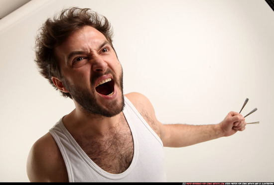 Man Adult Average White Fist fight Kneeling poses Casual